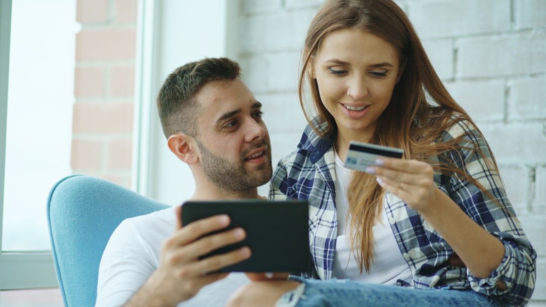 happy buyer completing online car purchase