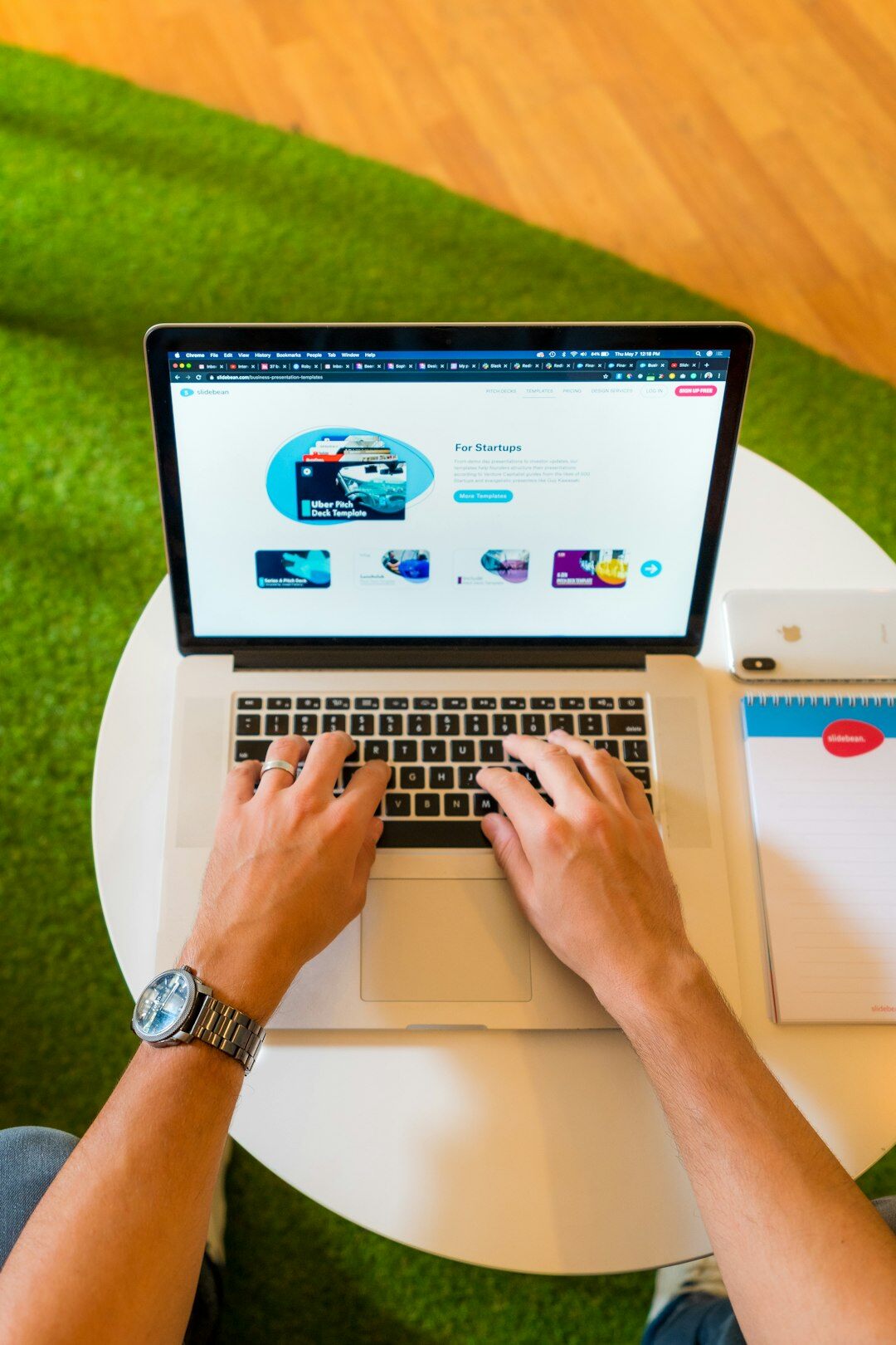 person browsing car listings on laptop